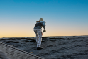Roofing contractor on the roof